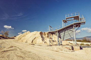 Gray metal observation building at a quarry