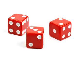 three red dices on white background.