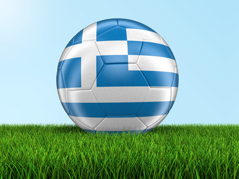 Soccer football with Greek flag on grass. Image with clipping path