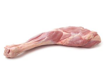 Fresh raw meat of a leg young lamb