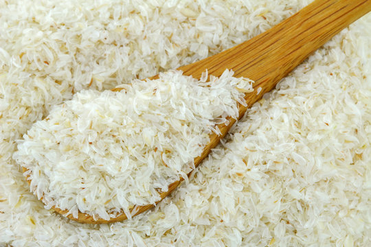 A spoon of dried psyllium husk fiber to relieve constipation, irritable bowel syndrome.