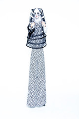 One cheerful clown dressed in black and white cloth on a white background