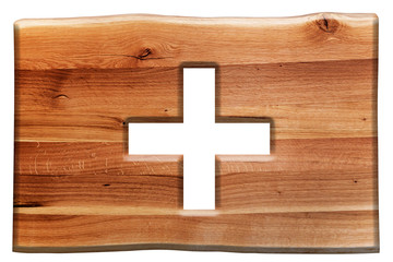 Fototapeta premium Cross cut in wooden board isolated on white