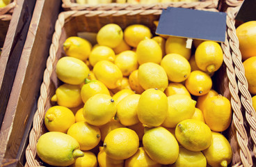 ripe lemons at food market