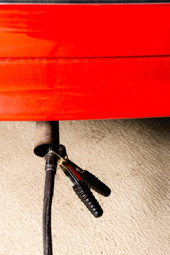 Measuring exhausts of a car in garage