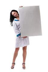 Woman doctor or nurse showing empty blank