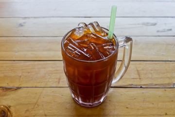 Thai Ice Tea with green straw © art9858