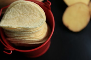 fresh potatoes with potato chips