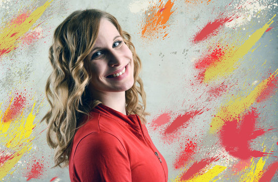 red yellow color splash wall with smiling Woman