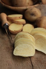 fresh potatoes with potato chips