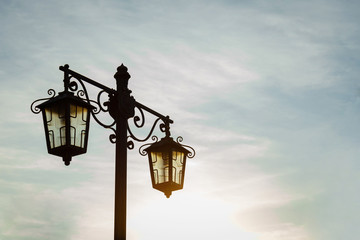 Vintage street lamp against the night sky