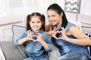 Mother and daughter on the sofa