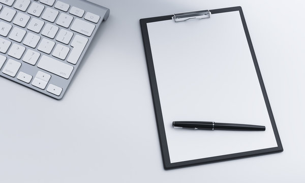 notepad and pen, keyboard, worklpace
