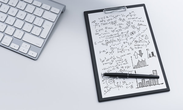 notepad and pen, keyboard, worklpace