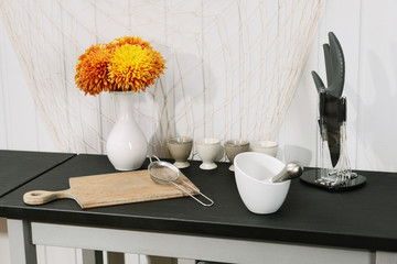 Kitchenware on table in the room