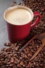 Coffee cup and beans