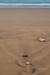 Fototapeta na wymiar Beach with stones and Atlantic ocean