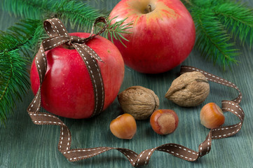 Fresh ripe apples on wooden table. Christmas concept. Vintage st
