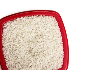 rice in a container on white background