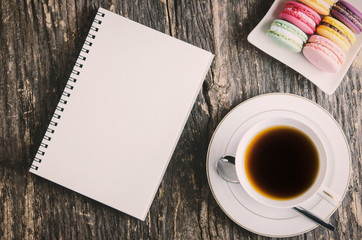 Obraz na płótnie Canvas White notebook and cup of tea