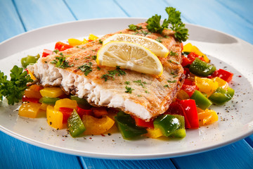 Fish dish - fried fish fillet and vegetables 