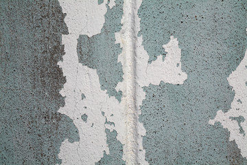 grunge peeling painted concrete wall.