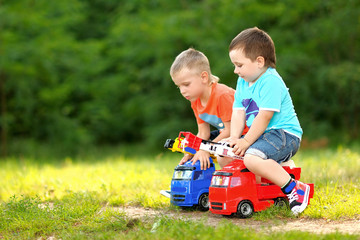 Portrait of two boys in the summer outdoors