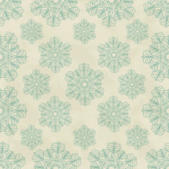 Seamless winter pattern with snowflakes.