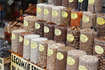 Typical Italian stall for selling legumes, nuts and spices.