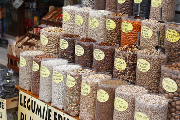 Typical Italian stall for selling legumes, nuts and spices.
