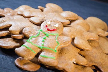 Christmas homemade gingerbread man on table