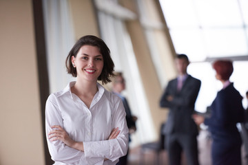 business people group, woman in front  as team leader