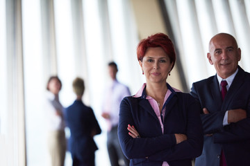 diverse business people group with redhair  woman in front