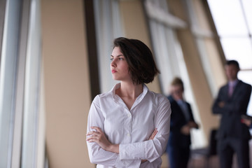 business people group, woman in front  as team leader