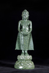 Jade sculpture of buddha isolated on black background