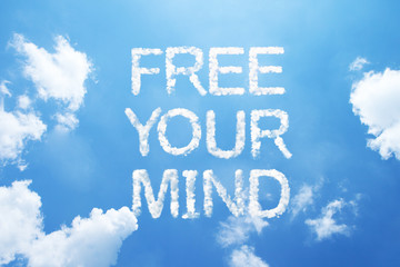 "Free your mind" cloud word on sky.