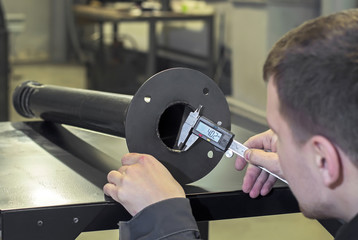 Measurement of metal parts mechanic engineer