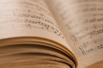 Naklejka premium Close up of piano classic music score and notes