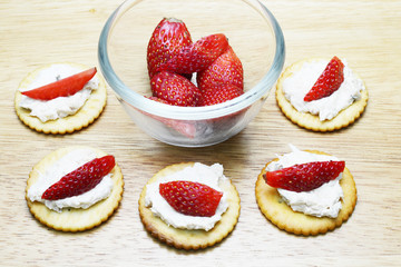 spread tuna and strawberry on biscuit 