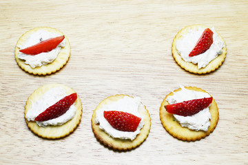 spread tuna and strawberry on biscuit 