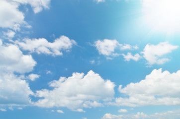 Obraz na płótnie Canvas White clouds and blue sky with sun light.