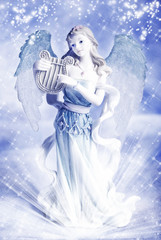a beautiful Christmas angel over blue winter backround with flakes of snow, white stars and rays of light