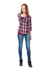 Obraz premium A girl standing in full body smiling showing his finger at the c