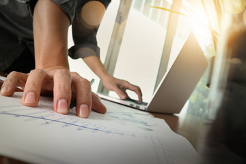 businessman hand working with new modern computer and business s