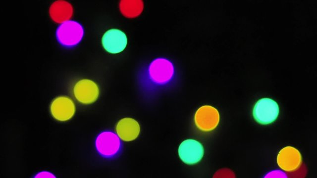 Blurred festive colorful garlands