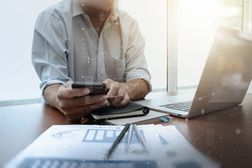 businessman hand working with new tablet modern computer and sma