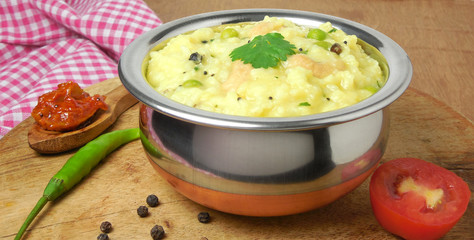 Indian food pongal, spicy variety. It is a vegetarian, traditional, popular and healthy dish made from rice and mung.