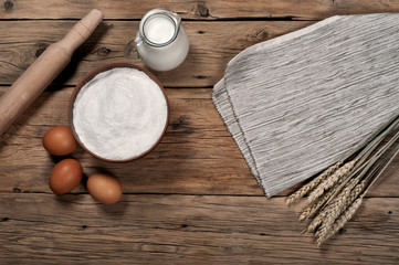 Fototapeta na wymiar Baking ingredients (milk, eggs, flour)