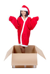 Beautiful woman in Santa Claus dress inside paper box