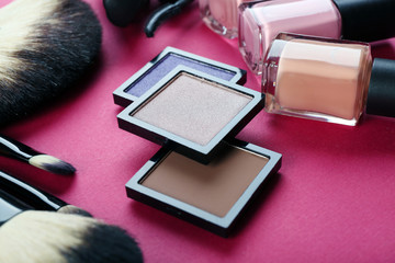 Cosmetics on pink background